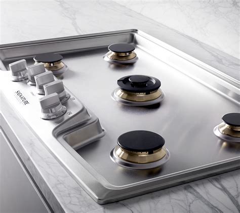 brass burners cooktop